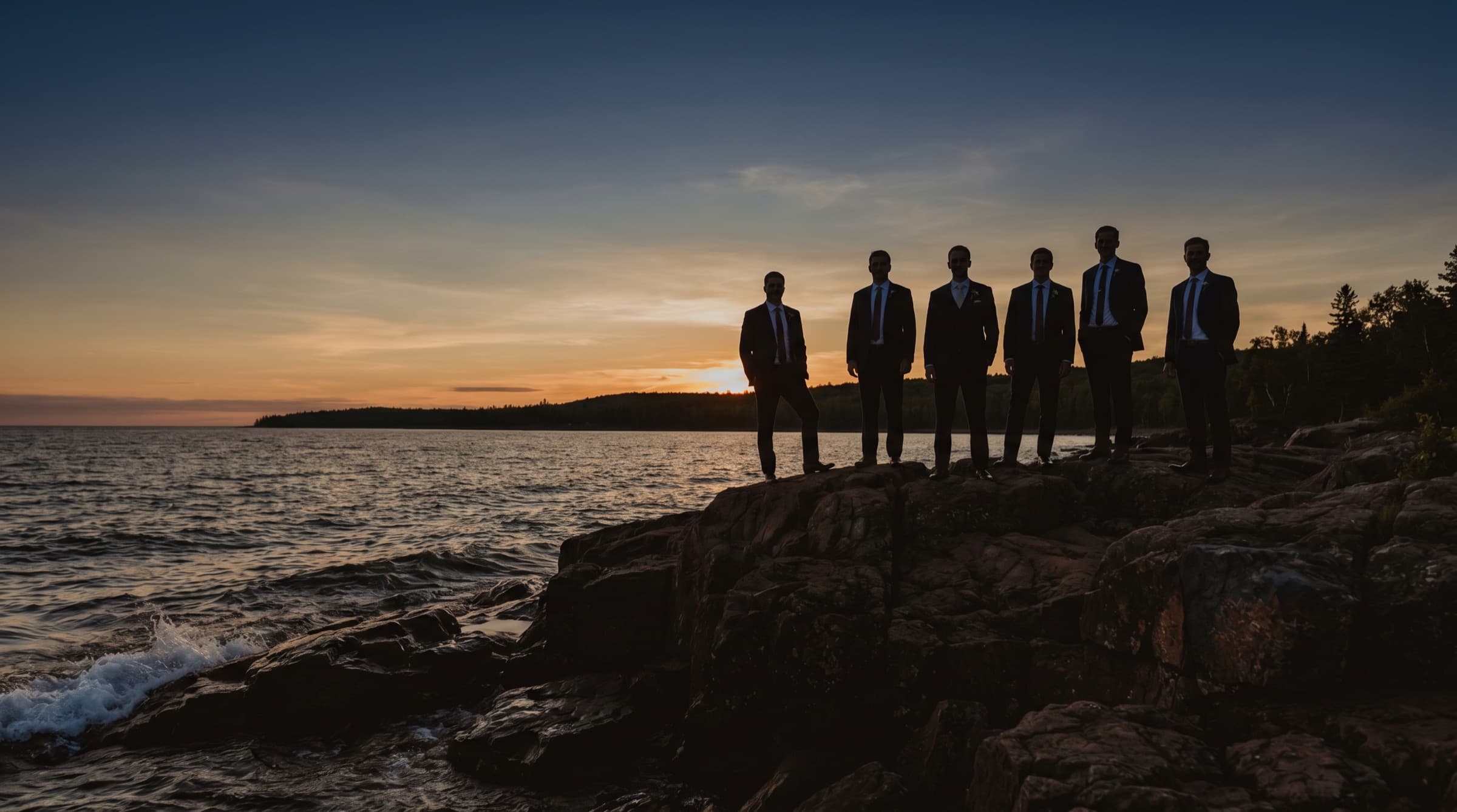 A wedding party at dusk on the North Shore